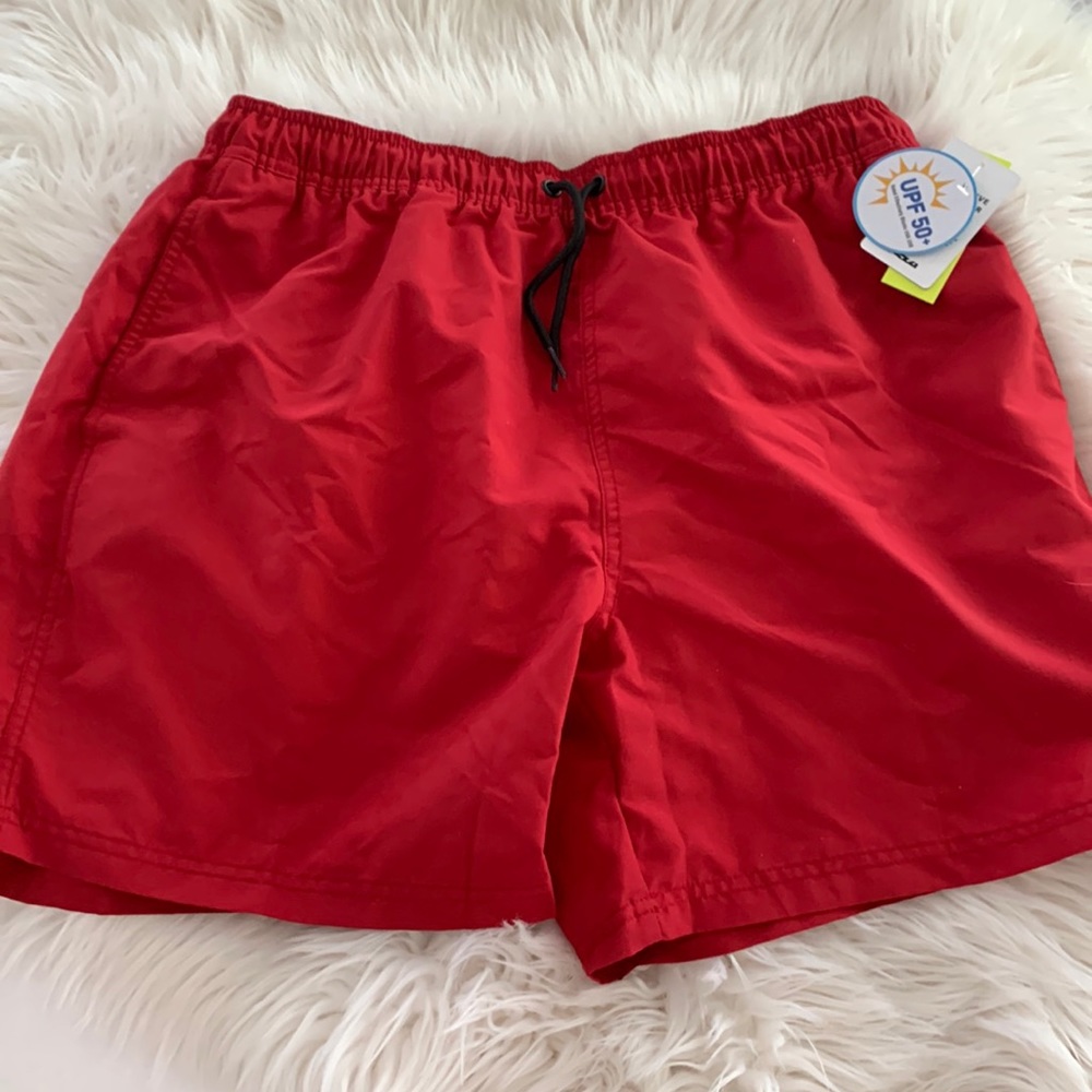 NWT men’s swim trunks by TSLA.